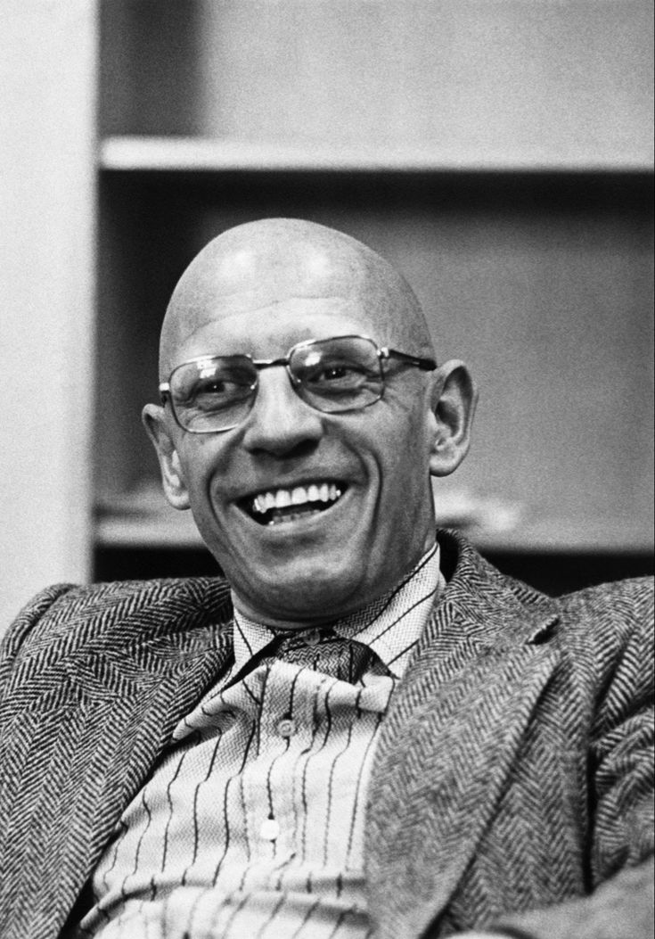 Portrait of Michel Foucault, philosopher known for his analysis of power, institutions, and social practices